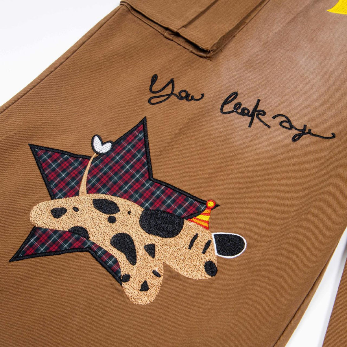 Star Puppy Patchwork Embroidered Multi Pocket Jeans by eprolo in brown denim with a plaid dog motif patch