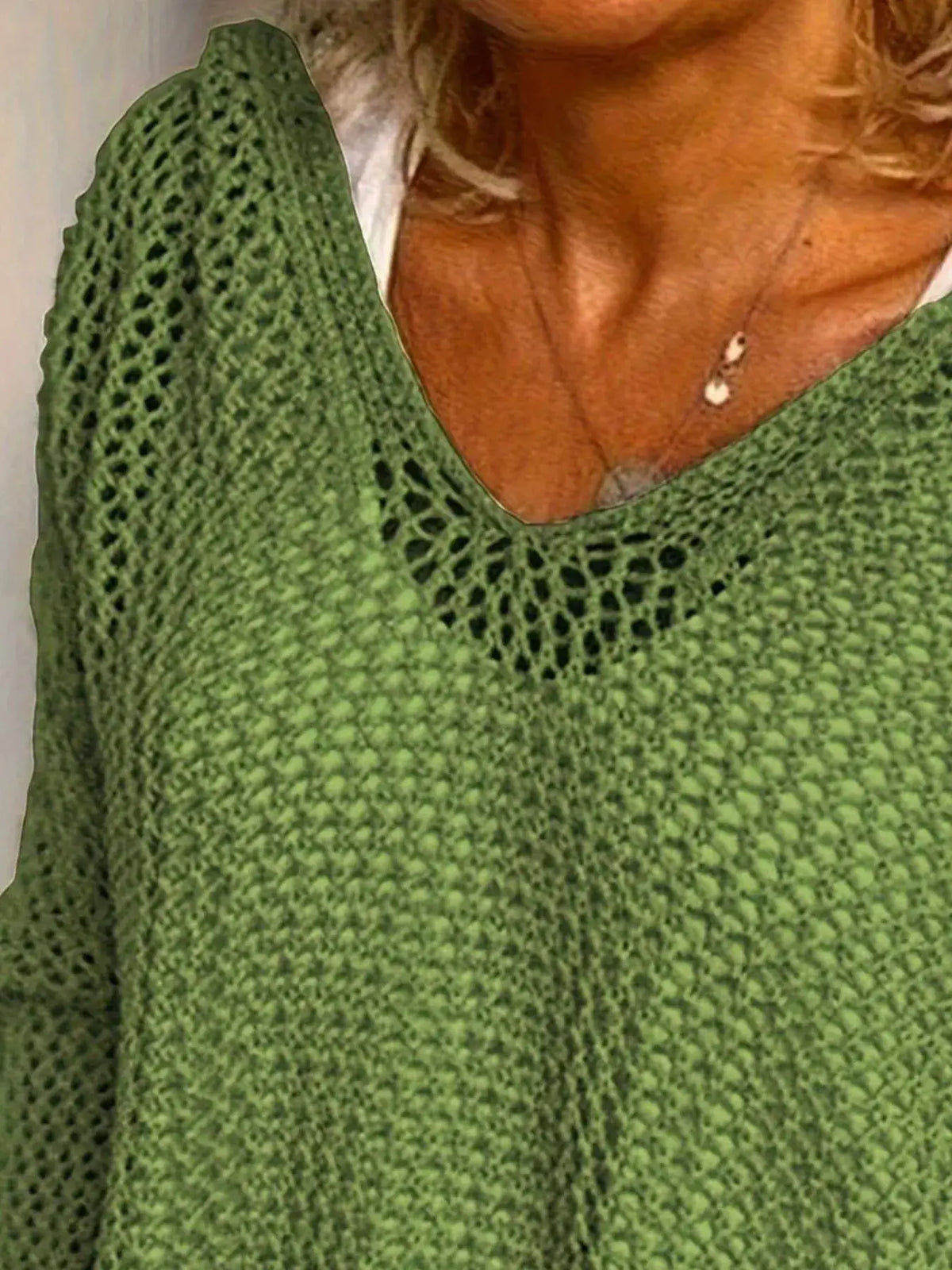 Openwork green knit beach cover-up with long sleeves