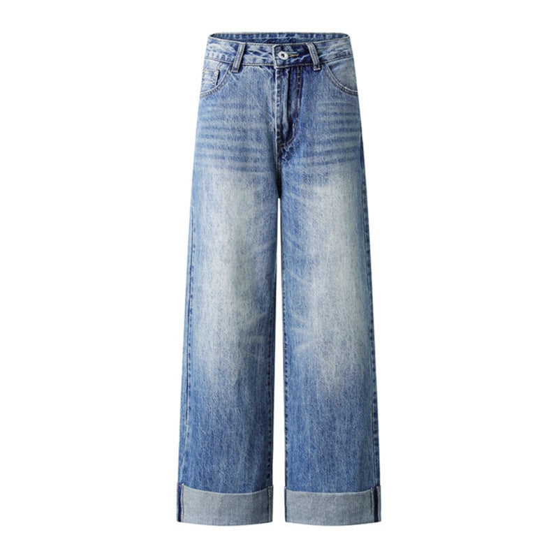 Blue washed denim jeans, wide-leg style with rolled cuffs