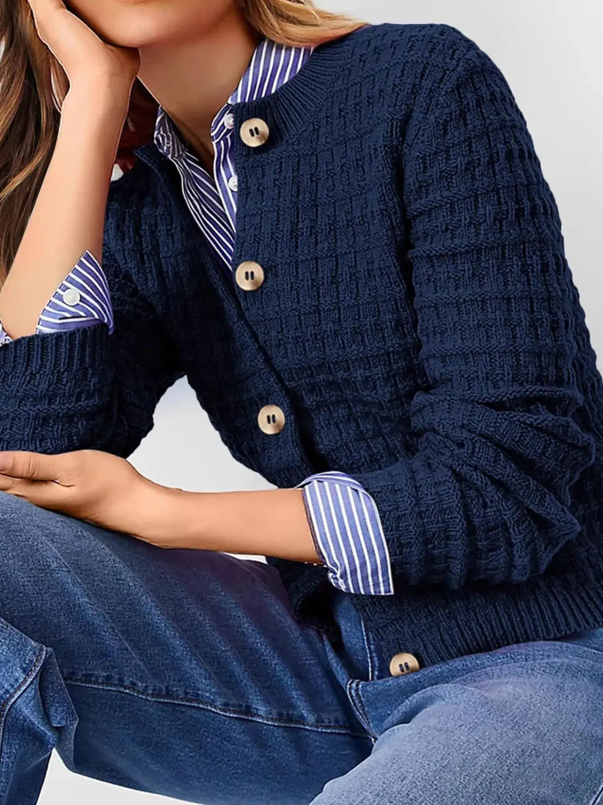 Textured stretchy knit button-front cardigan in navy by Trendsi, styled over a blue striped shirt