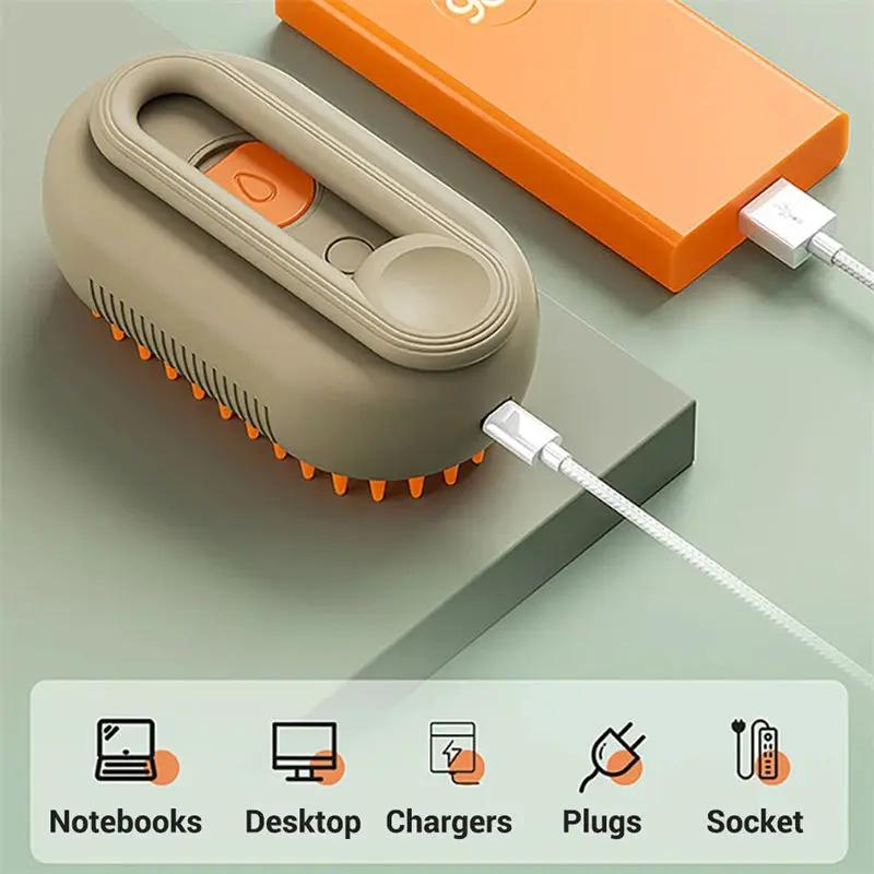 AdTec Cat Steam Brush 3-in-1 electric grooming brush with beige body, orange bristles and USB charger