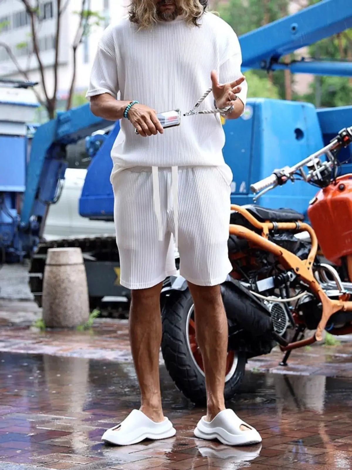 Men's white ribbed knit short-sleeve top and matching shorts set with drawstring pockets
