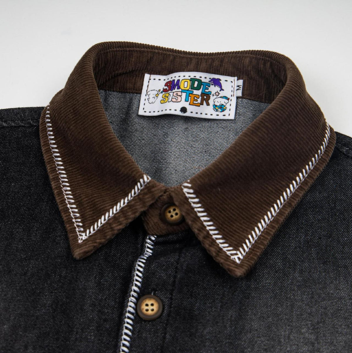 Cat Embroidered Cowboy Short Sleeve denim top with brown corduroy collar and white stitching.