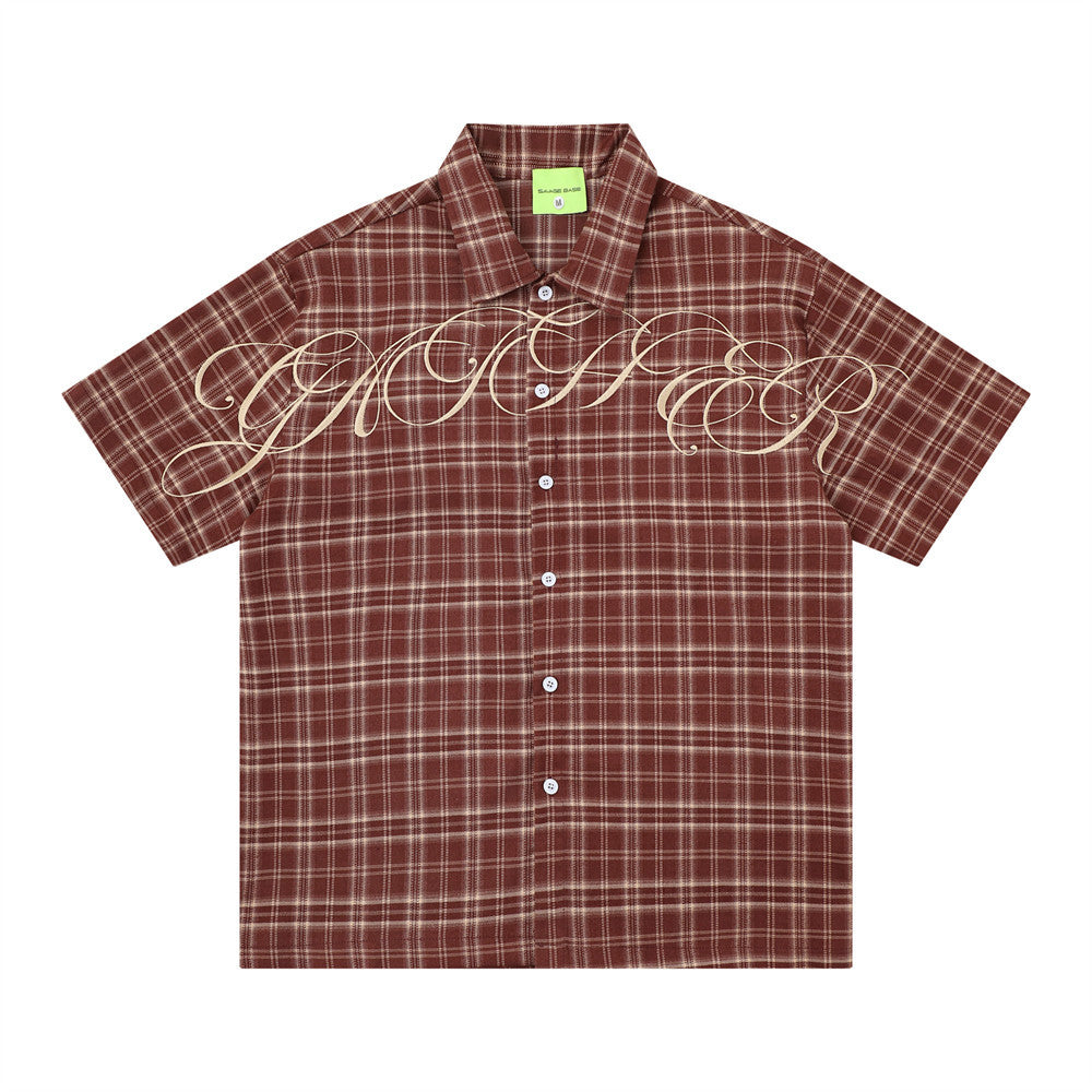 eprolo loose short-sleeve checkered shirt in burgundy plaid with script graphic across chest.