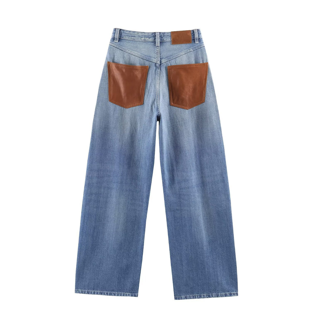 High waisted wide-leg jeans with brown leather back pockets on blue denim
