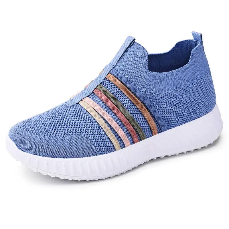 Women's breathable knit sneakers with blue mesh upper and multicolor stripe detail, white sole.