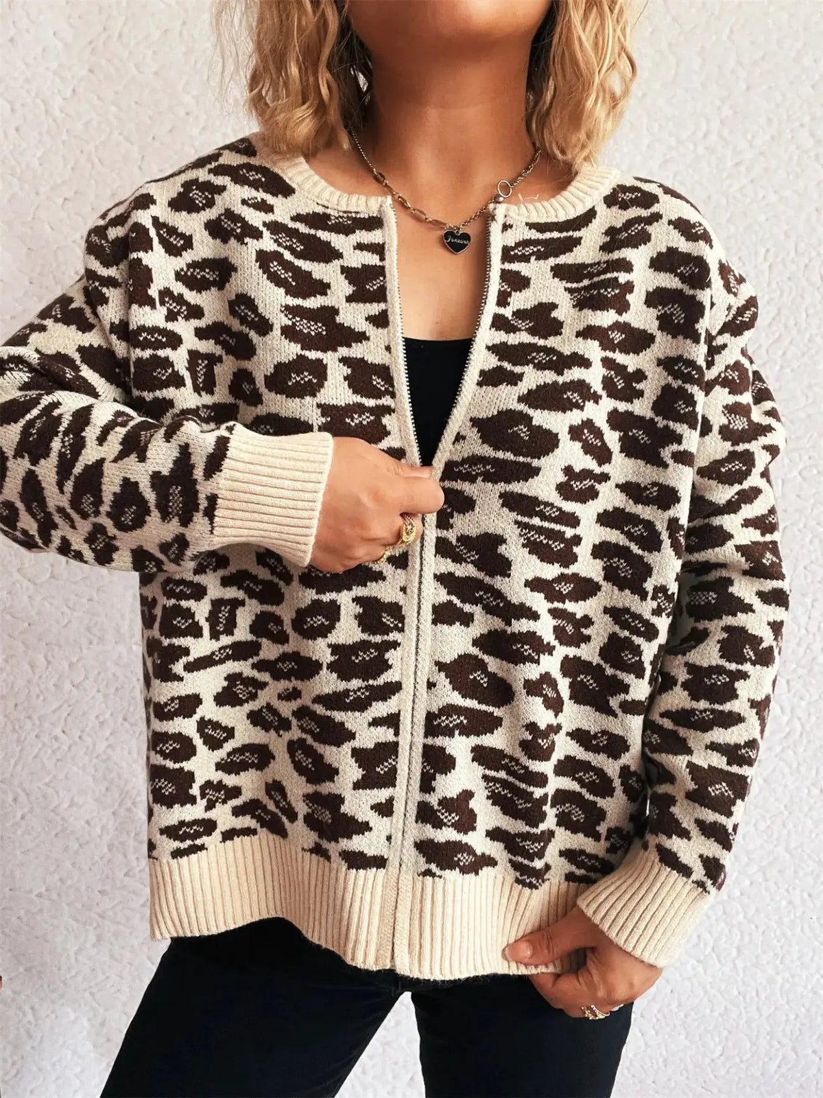 Zip-up leopard print knit cardigan in cream and brown with ribbed cuffs