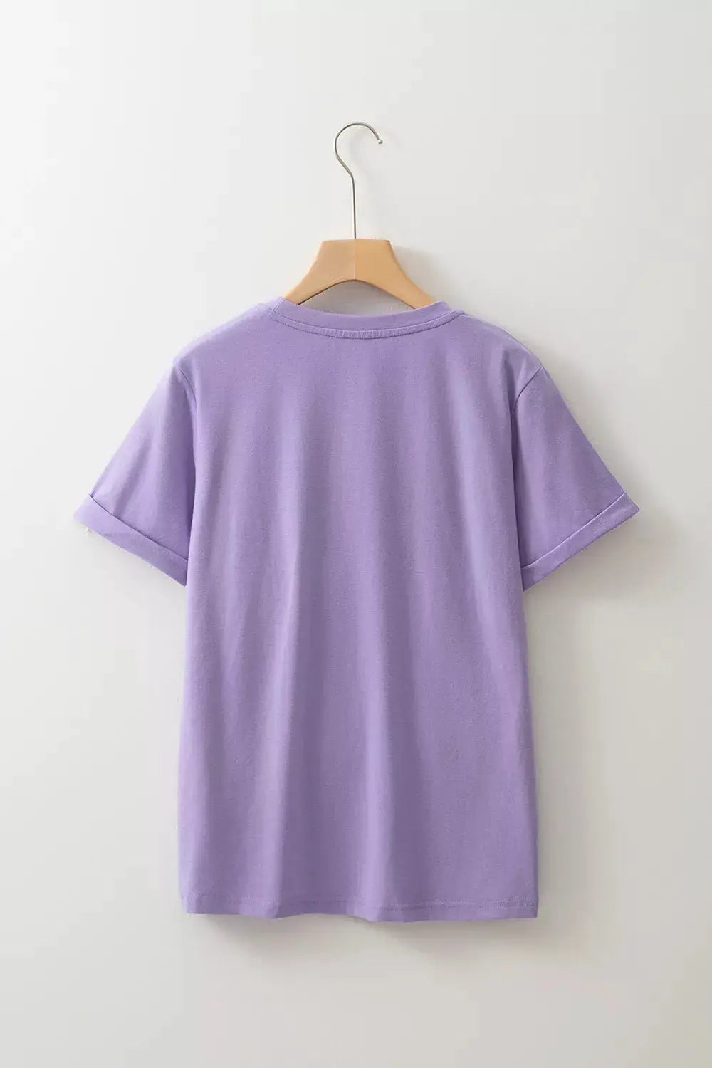 Lavender cotton-blend T-shirt on a wooden hanger, back view against white background