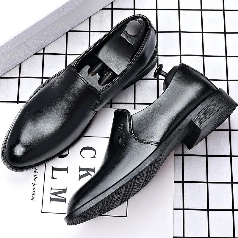 Pair of men's black AdTec leather slip-on dress shoes with pointed toe