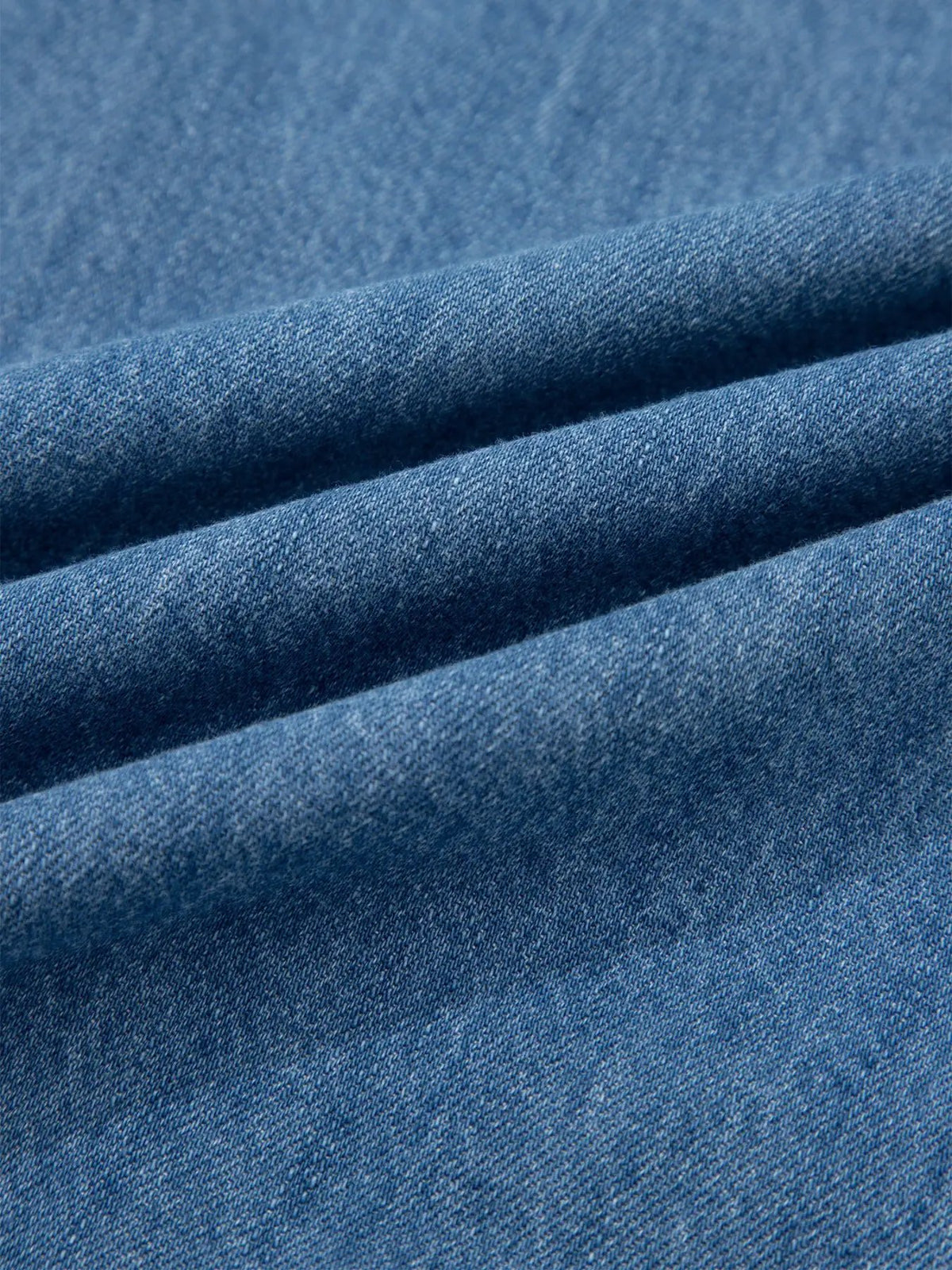 Denim blouse fabric close-up in blue for Women’s Ruffled Short Sleeve Denim Button Up Blouse