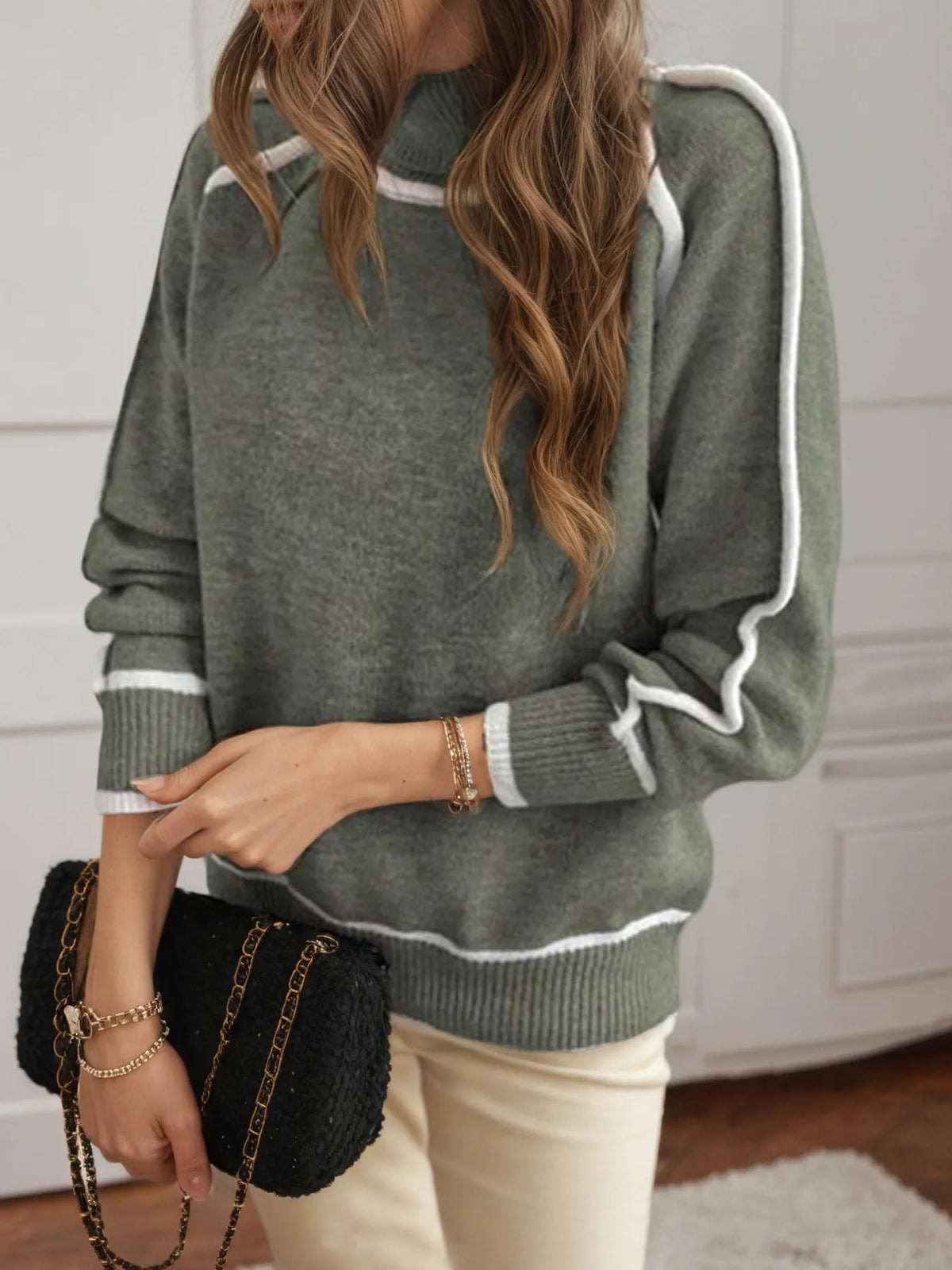 Turtleneck sweater by Trendsi in olive green with white contrast trim and soft ribbed knit.