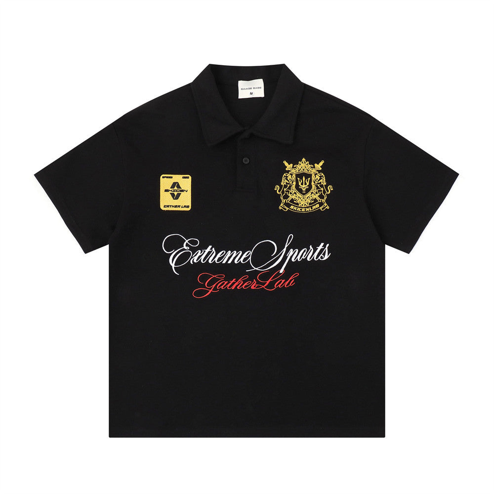 Emblem letter embroidered short sleeve T-shirt, black with two yellow chest patches and white/red script text.