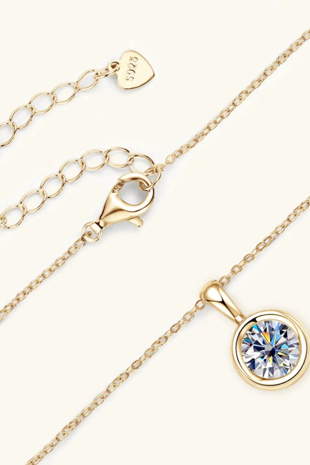 2 Carat Moissanite Necklace with gold-tone bezel-set pendant; 925 tag visible