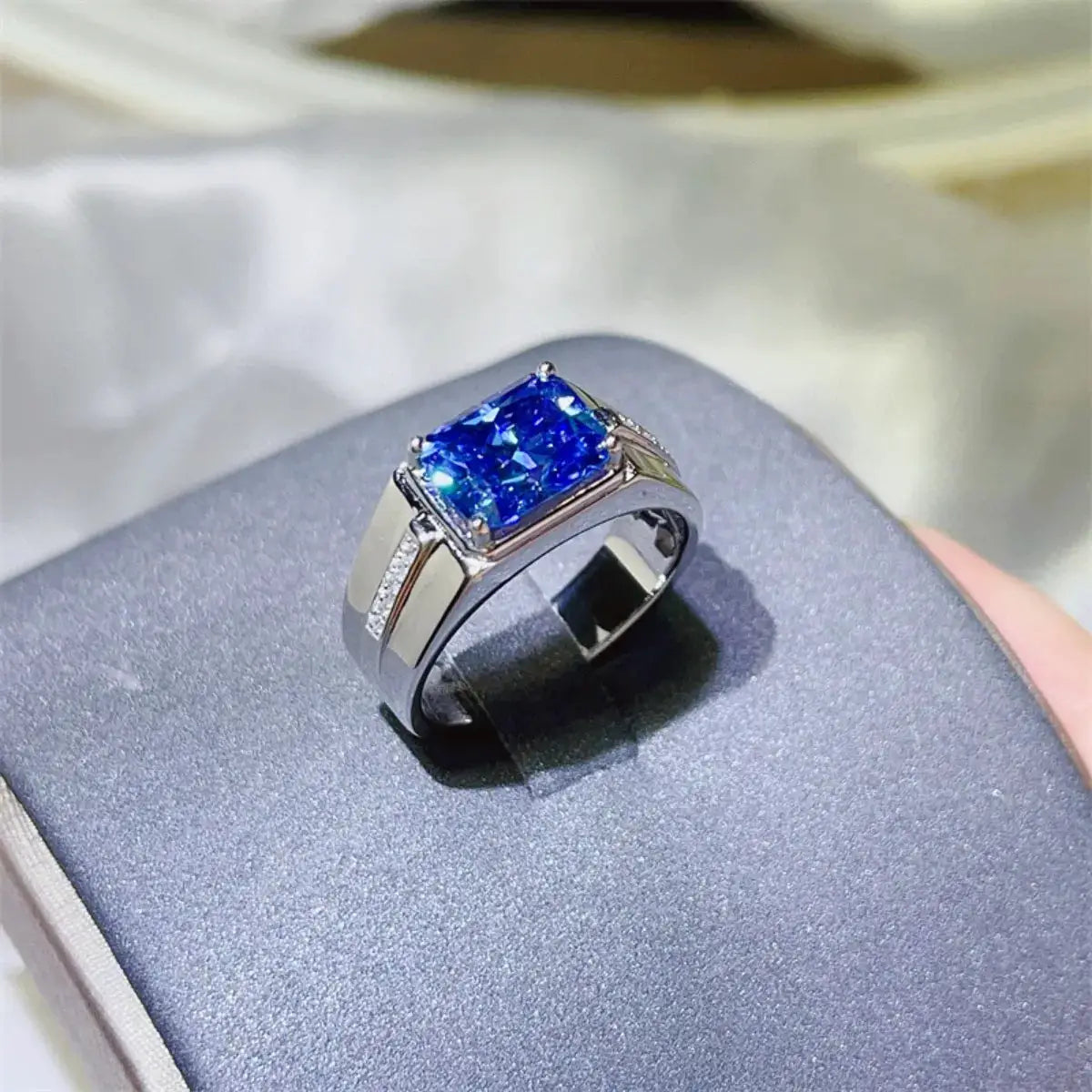 2 Carat Moissanite 925 Sterling Silver Ring with blue cushion-cut center stone and pavé side accents