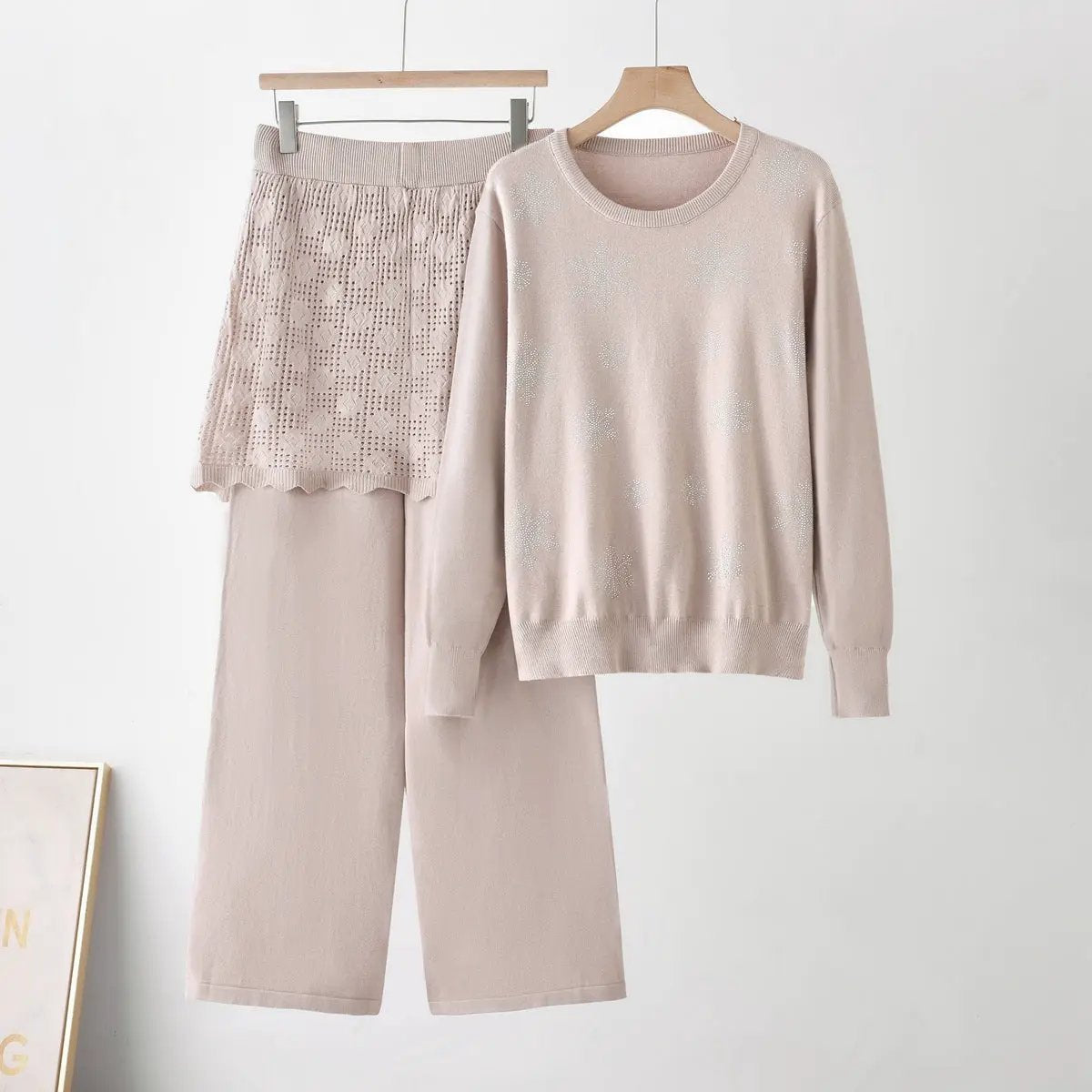 Women's rhinestone knit set with round-neck sweater and matching soft pink wide-leg pants