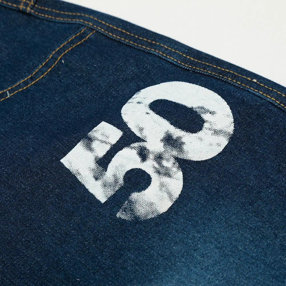 Printed and painted denim wide-leg pants in dark blue with a white graphic print