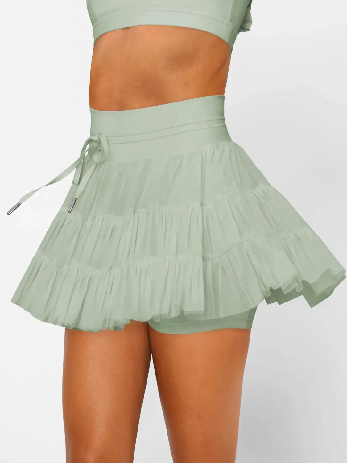 Ruched mini skort with pockets in mint green by Trendsi
