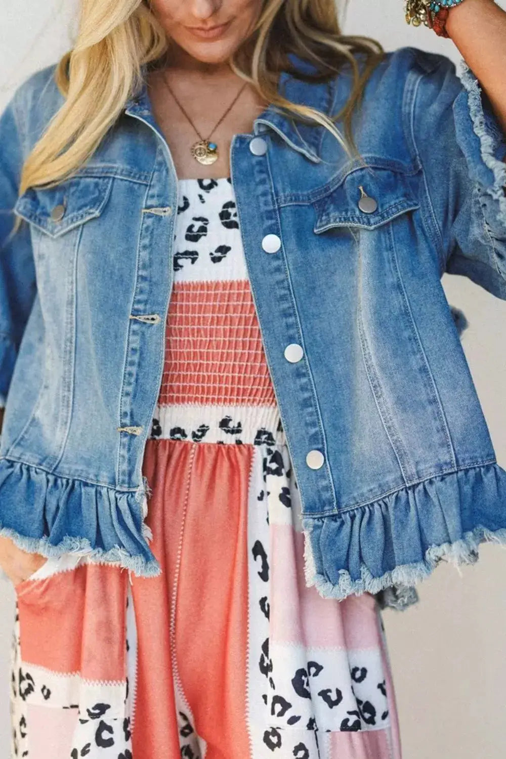 Trendsi womens denim jacket with ruffle hem, raw edge, half sleeves, front snaps, light wash.