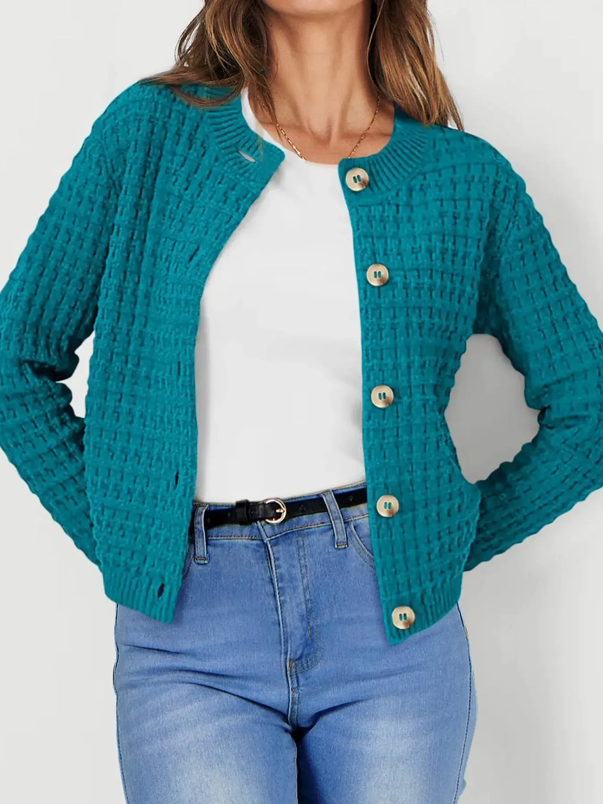 Textured stretchy knit button-front cardigan in teal with wooden buttons by Trendsi, worn over a white top and jeans.
