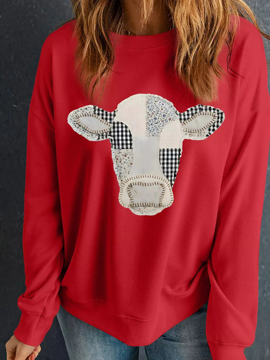 Red Western patchwork cow drop-shoulder sweatshirt with a multi-fabric cow head design