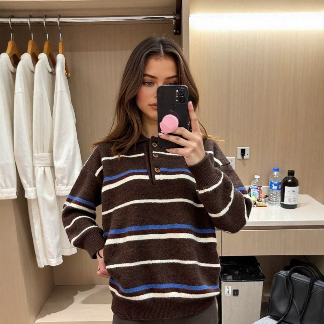 Striped contrasting long-sleeved women's knit sweater in brown with white and blue stripes.