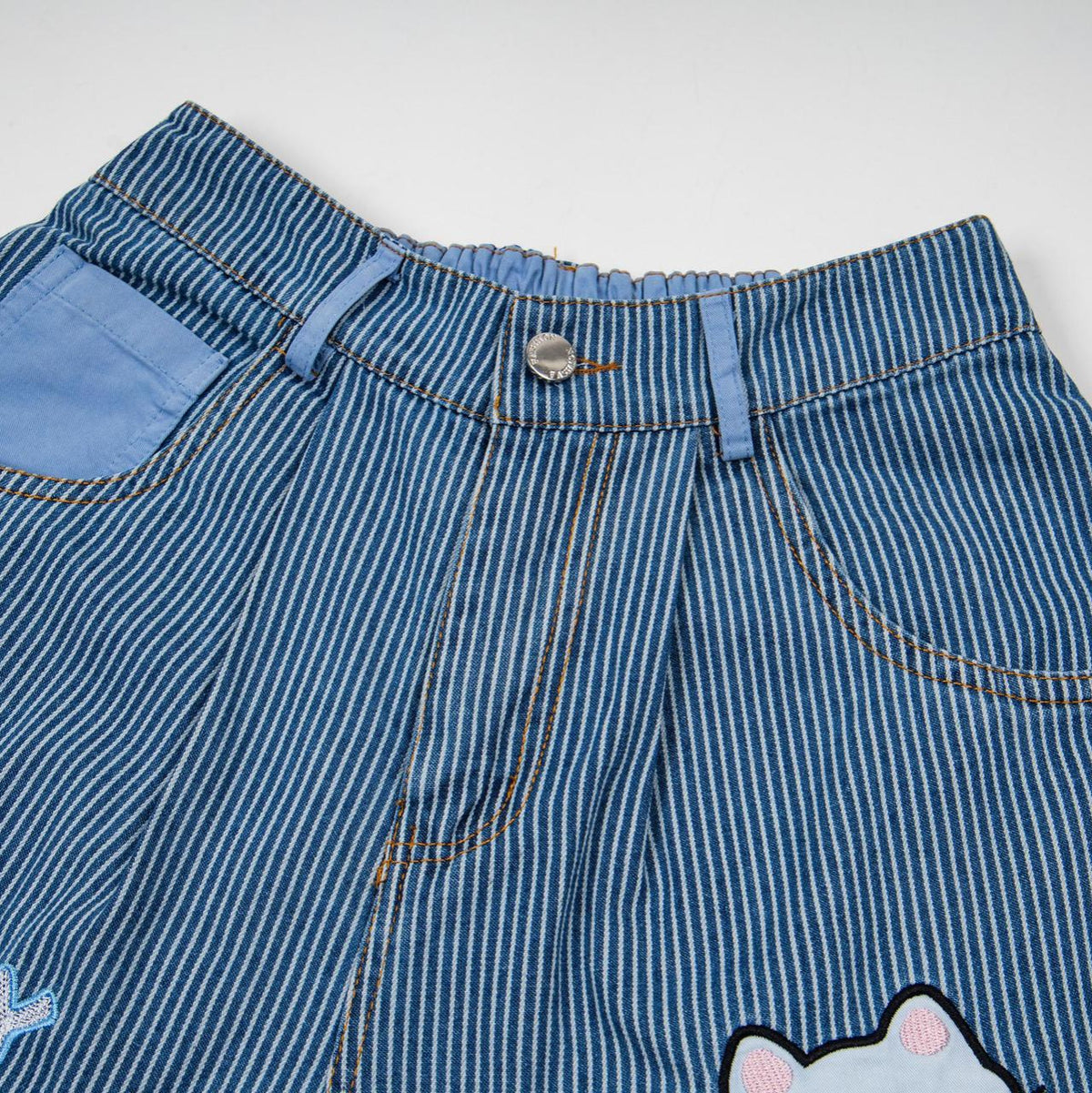 Cat Rabbit Embroidered Jeans in light blue striped denim by eprolo with metal button