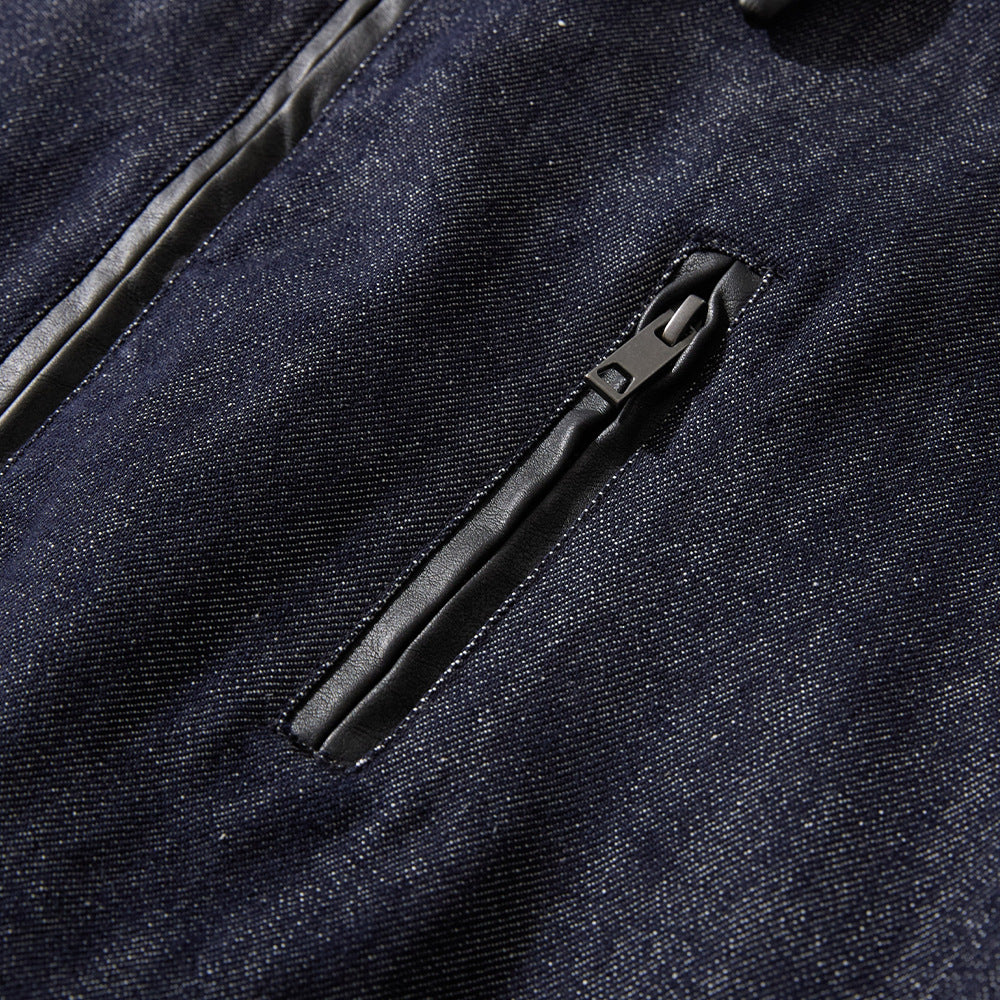 denim jacket with black zipper pocket on dark indigo denim fabric