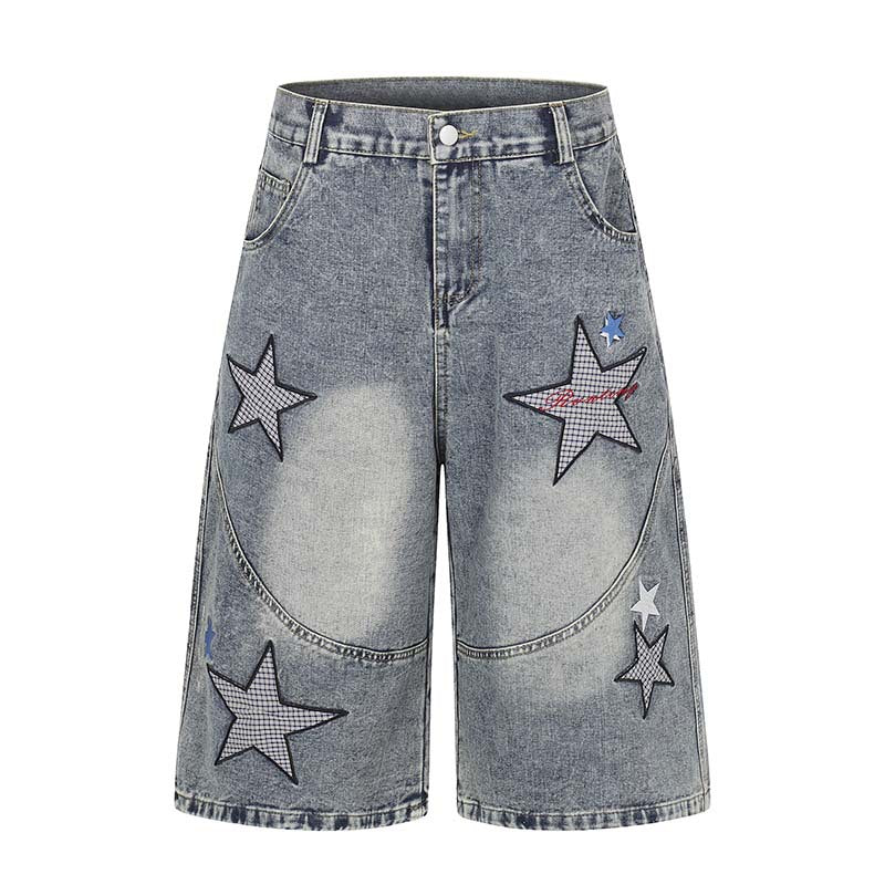 Denim shorts with multiple five-point star embroidery patches on light-blue distressed denim