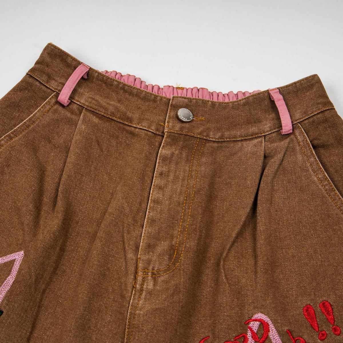 Maillard puppy patch embroidered jeans by eprolo; brown denim with pink elastic waistband and pink belt loops