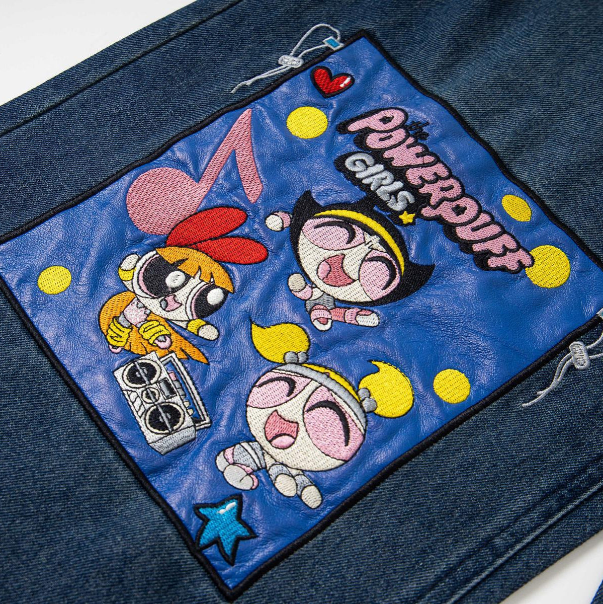 Cartoon embroidery jeans patch on blue denim by eprolo, street fashion style