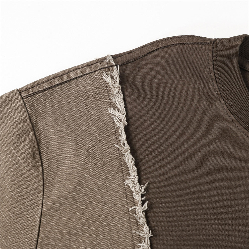 Irregular color-blocked fringed short-sleeve T-shirt, brown panels with fringe along the shoulder seam.