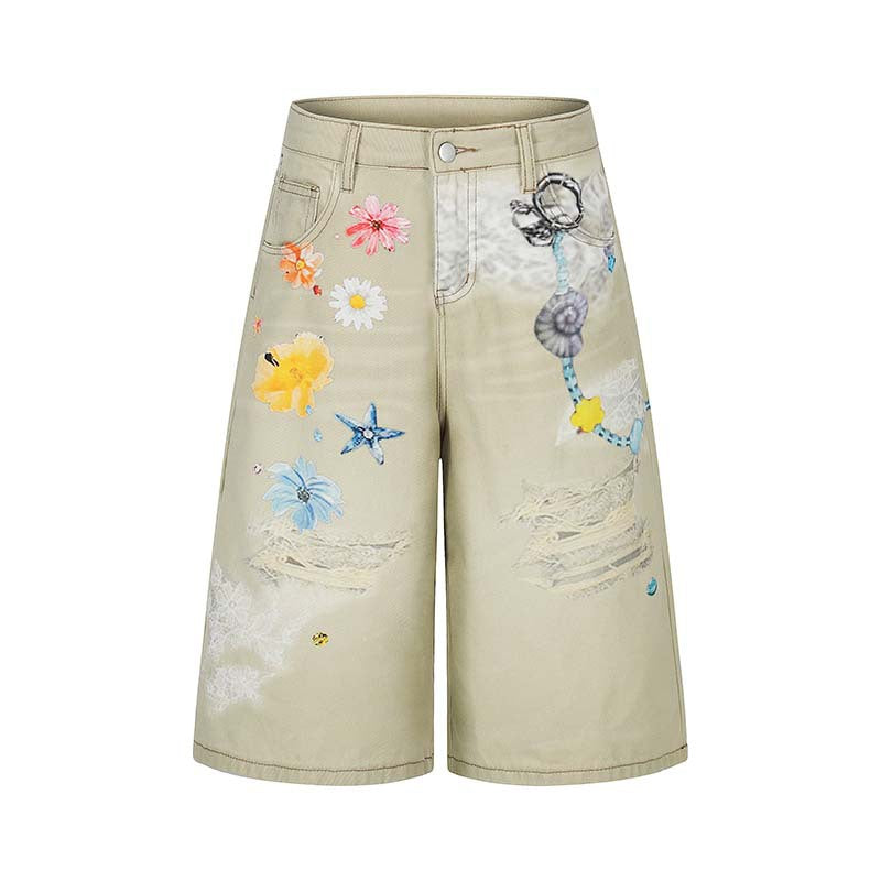 Denim shorts in apricot wash with colorful floral print and distressed patches by eprolo