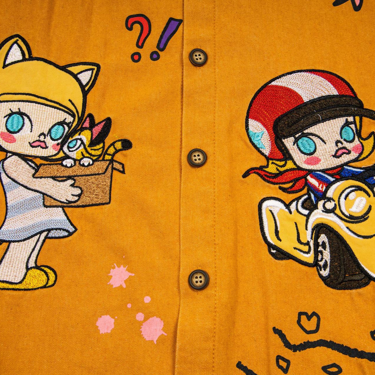 Dopamine cartoon patch embroidered shirt by eprolo; orange with colorful characters and front button placket.