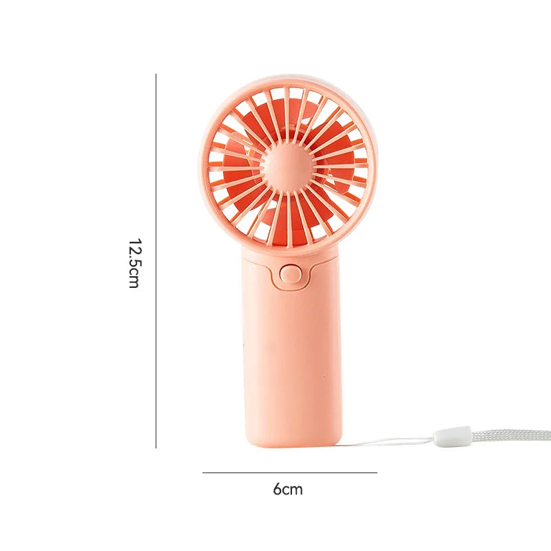 MEET SUN portable pink handheld fan; compact pocket-size mini fan, plastic body, AAA batteries not included