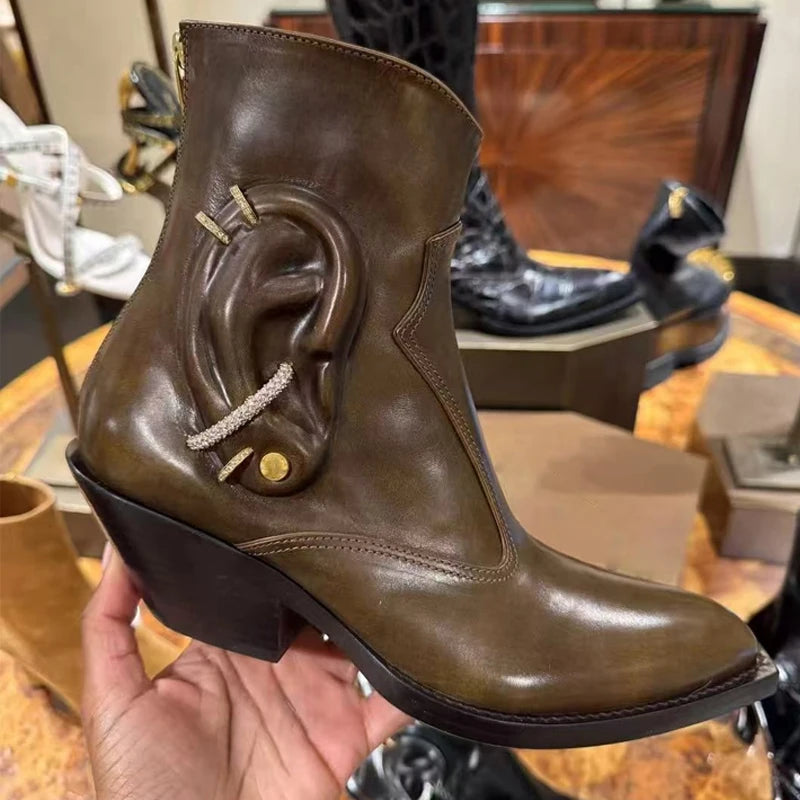 Women's pointed-toe ankle boots in brown leather with 3D ear-shape detailing and chunky heel
