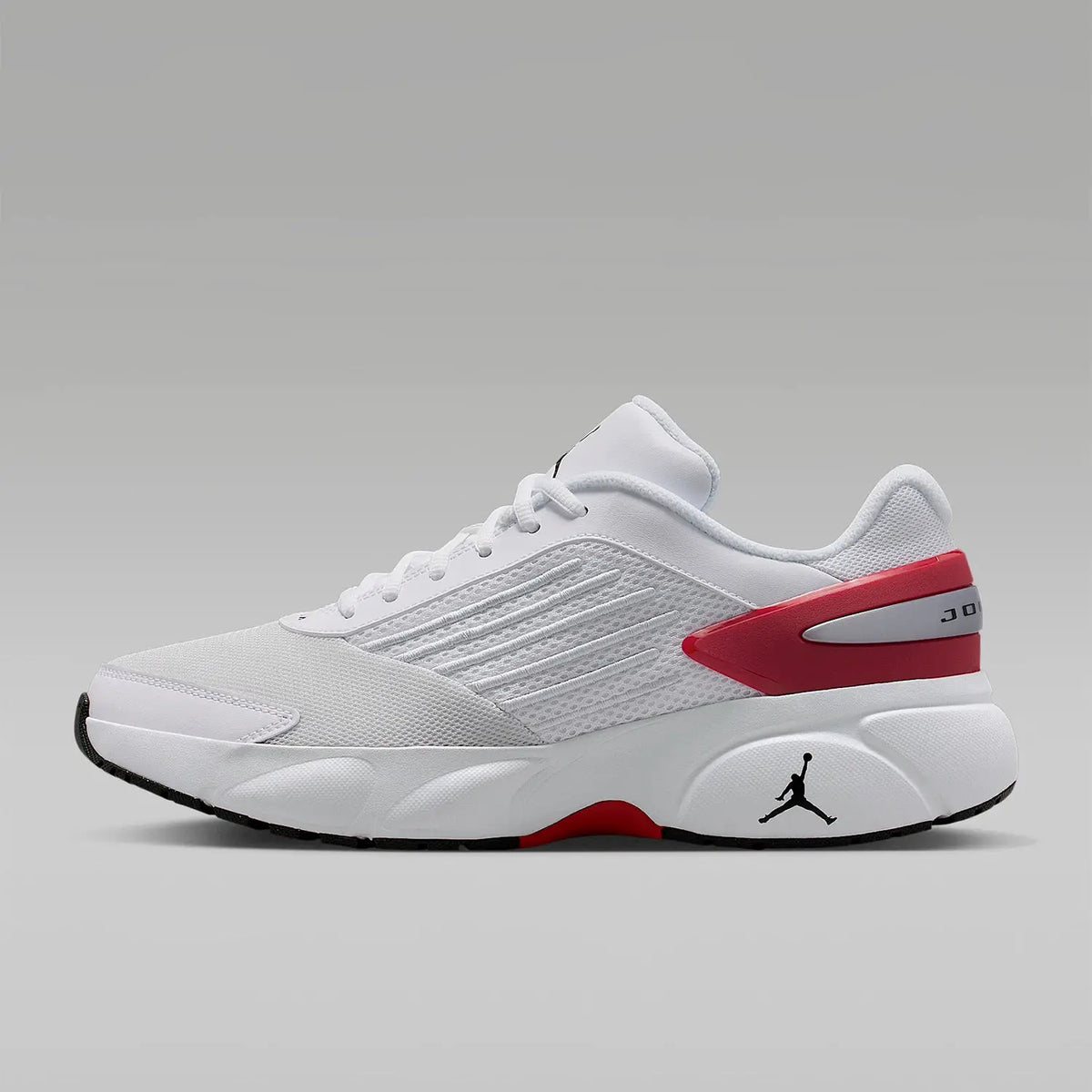 Jordan men's white low-top cushioned sneakers with red heel detail and Jumpman logo.