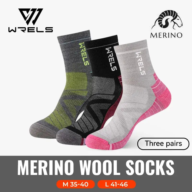 WRELS merino wool socks, three pairs shown in green-gray, black, and gray-pink.