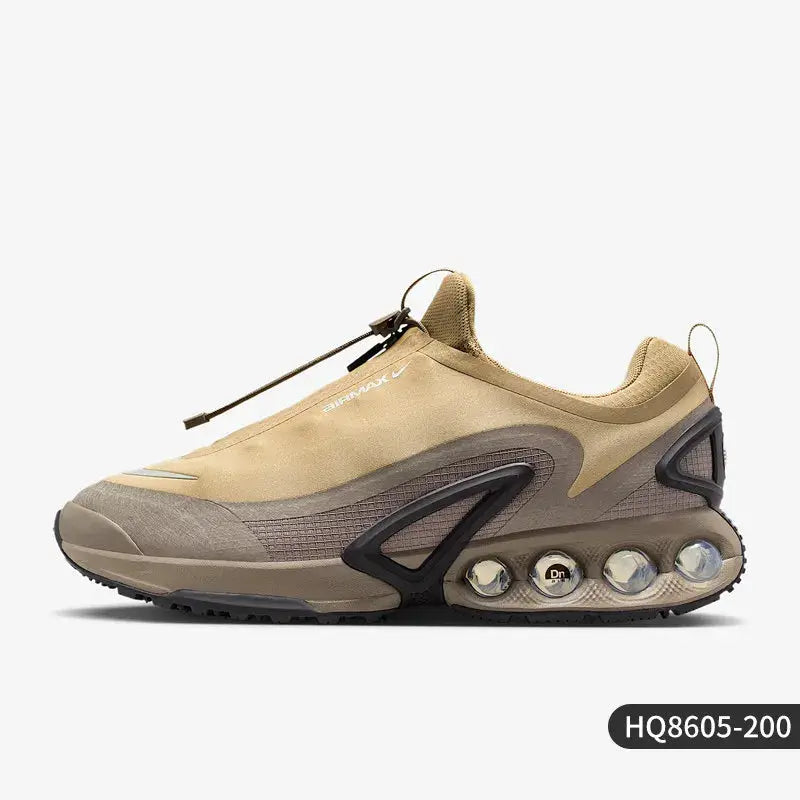 Nike Air Max Dn Roam men's low-cut sneaker in tan beige with visible heel Air units and rugged sole