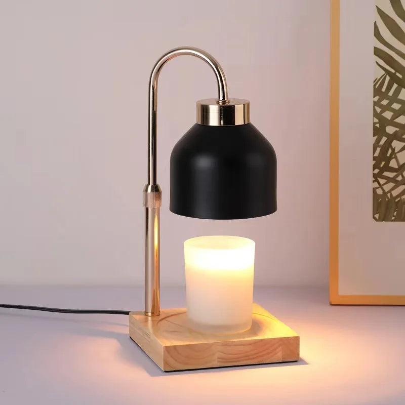 Candle Warmer Lamp with black shade and wooden base, glowing candle