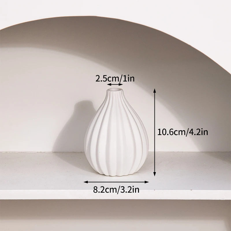 Ceramic ribbed vase, white; 10.6 cm tall, 8.2 cm wide, PrimeCanada.Store decor for dried flowers