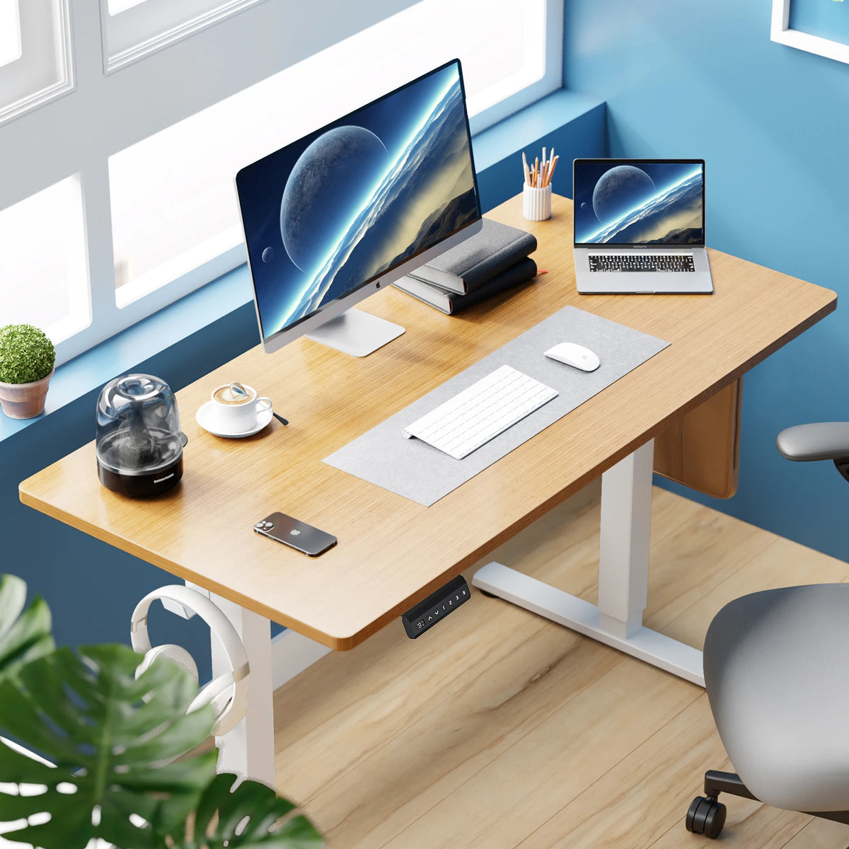JHK Electric Standing Desk with memory height adjustments; light wood top, white frame with monitor and laptop