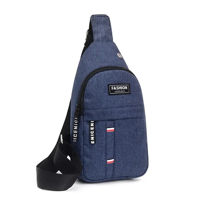 Men's waterproof large-capacity fanny pack in blue denim-like fabric with front logo patch and black adjustable strap