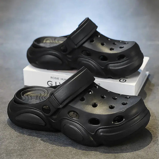 AeroStep CloudSoft men's breathable slippers, black pair of perforated clogs with adjustable strap.