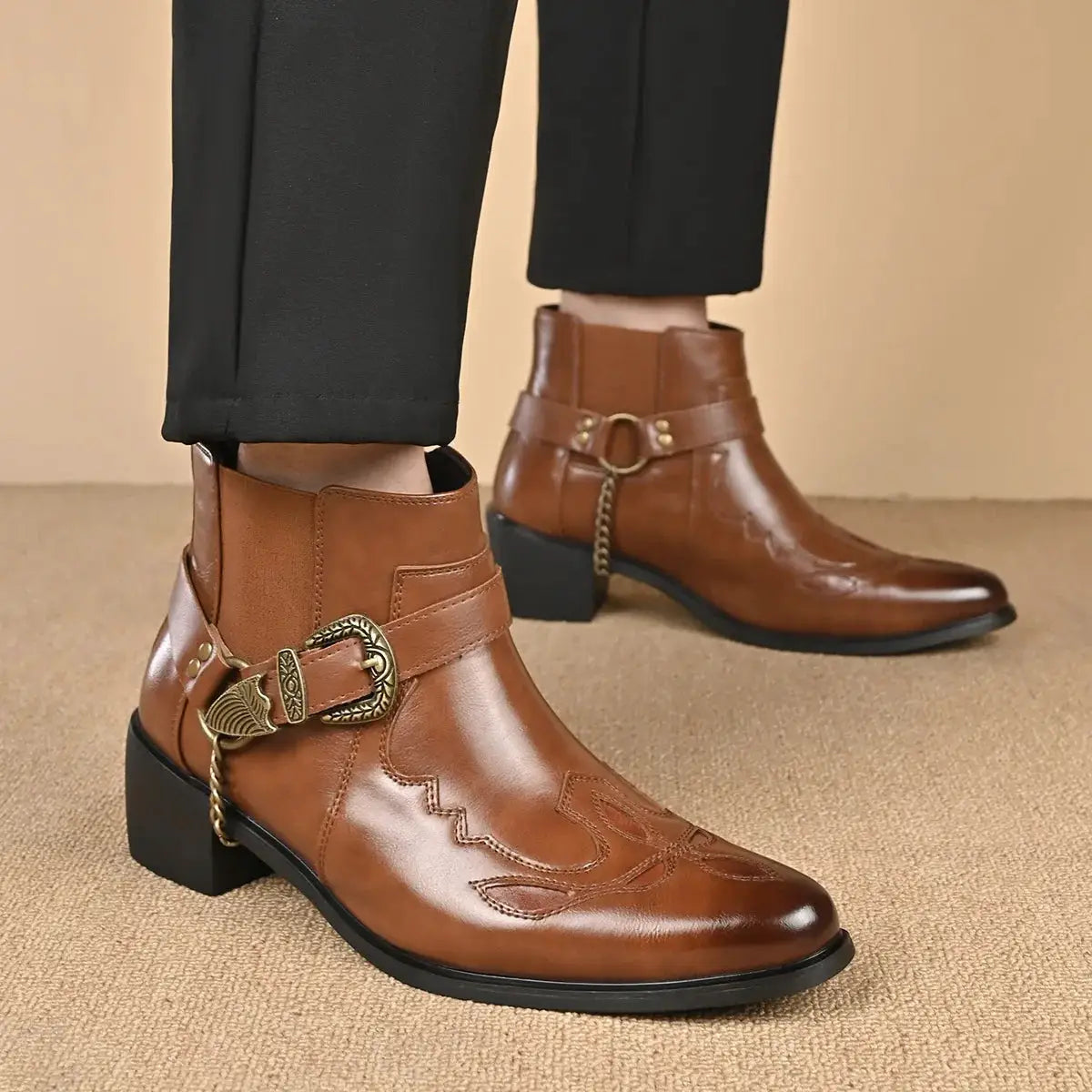 Men's vintage brown leather cowboy boots, pair shown, with decorative buckled strap and Western stitching.