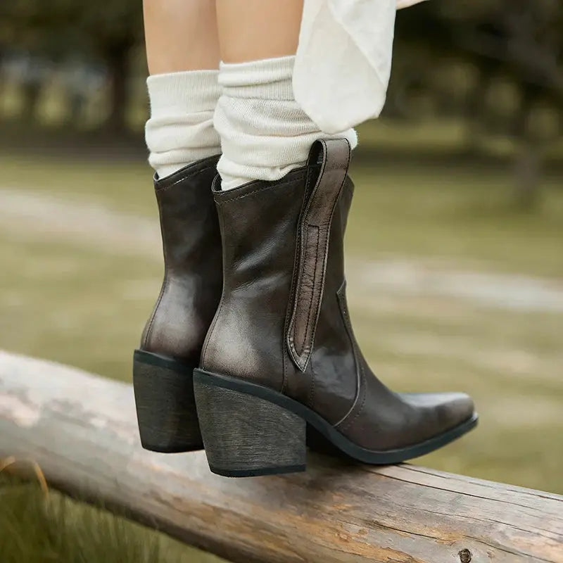 Shoes: Premium leather western ankle boots with a sleek pointed toe, dark brown, block heel.