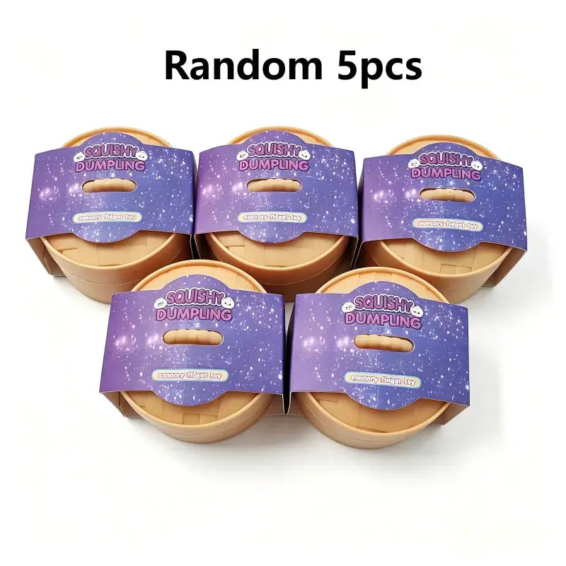 Five tan mini squishy dumplings with purple galaxy sleeves labeled Squishy Dumpling