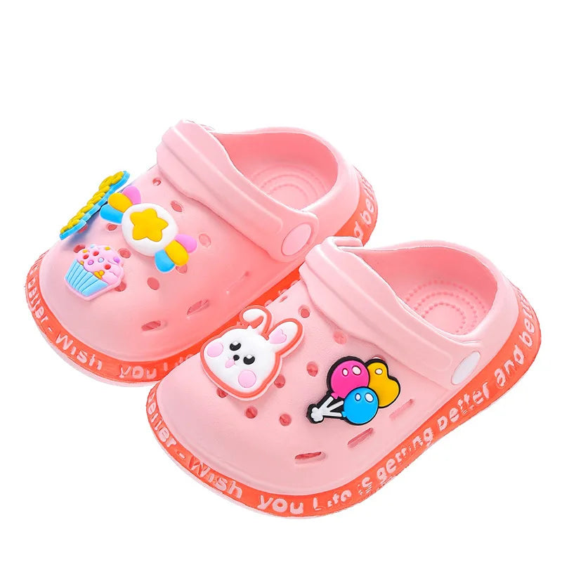 Kids Cartoon Summer Sandals pair, pink clog-style sandals with bunny and balloon decorations.