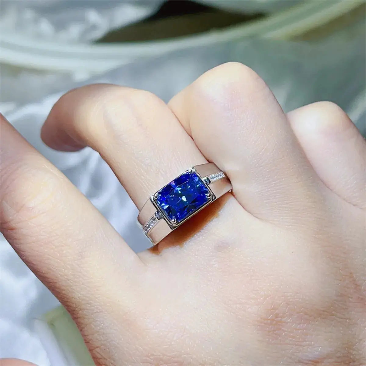 2 Carat Moissanite Sterling Silver Ring with blue cushion-cut stone