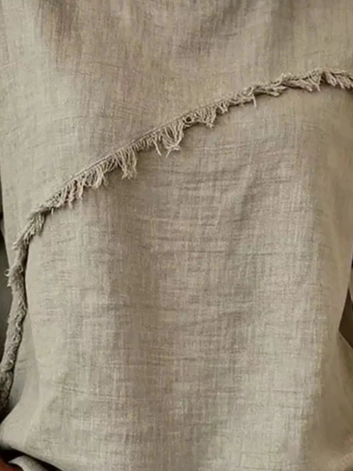 Trendsi full-size plus-size short-sleeve top with frayed hem in light beige knit fabric.