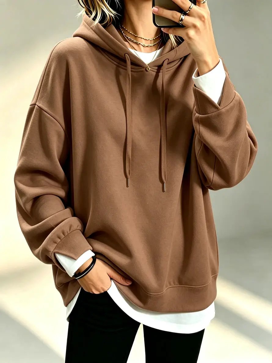 Plus-size loose-fit long-sleeve solid-color hoodie in brown with drawstrings.